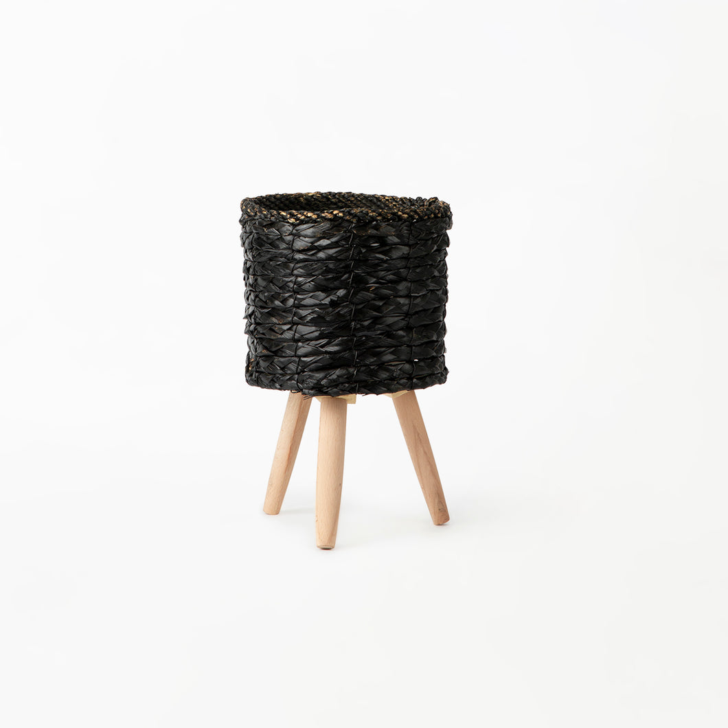 Black Basket on Wooden Stand
